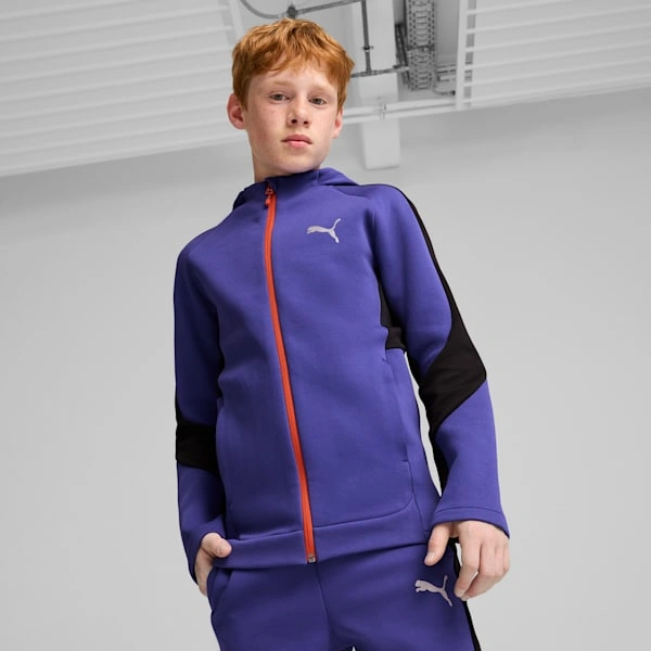 “Chándal PUMA EVOSTRIPE para niños: estilo y comodidad para jugar y divertirse sin límites.”
